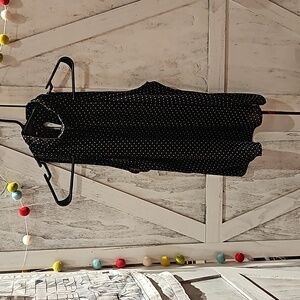 Womens sleeveless polka dot blouse black . Size M .